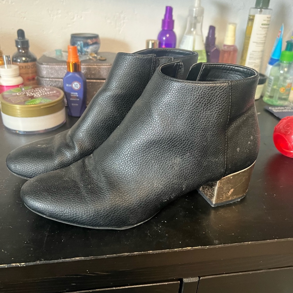 Used black booties gold heel